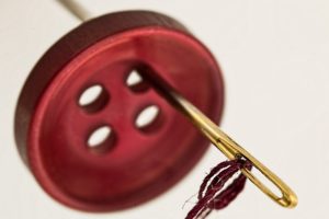 a needle and a button