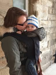 woman carrying a baby